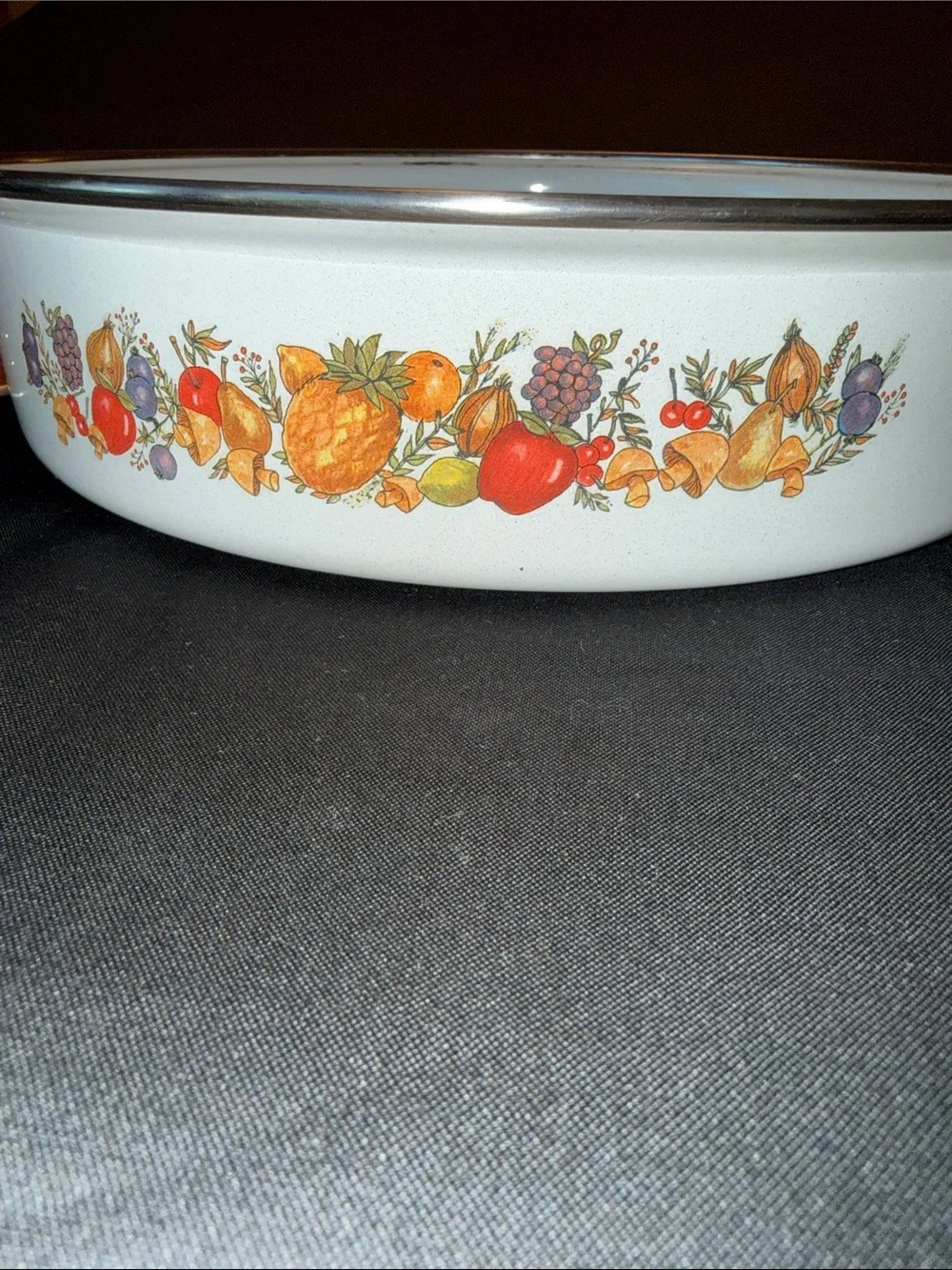 1970s enamelware skillet  featuring a retro “Spice of Life” motif.